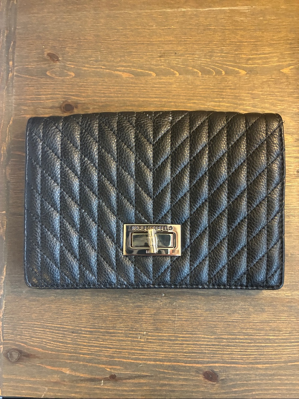 Karl Lagergeld Paris black leather clutch